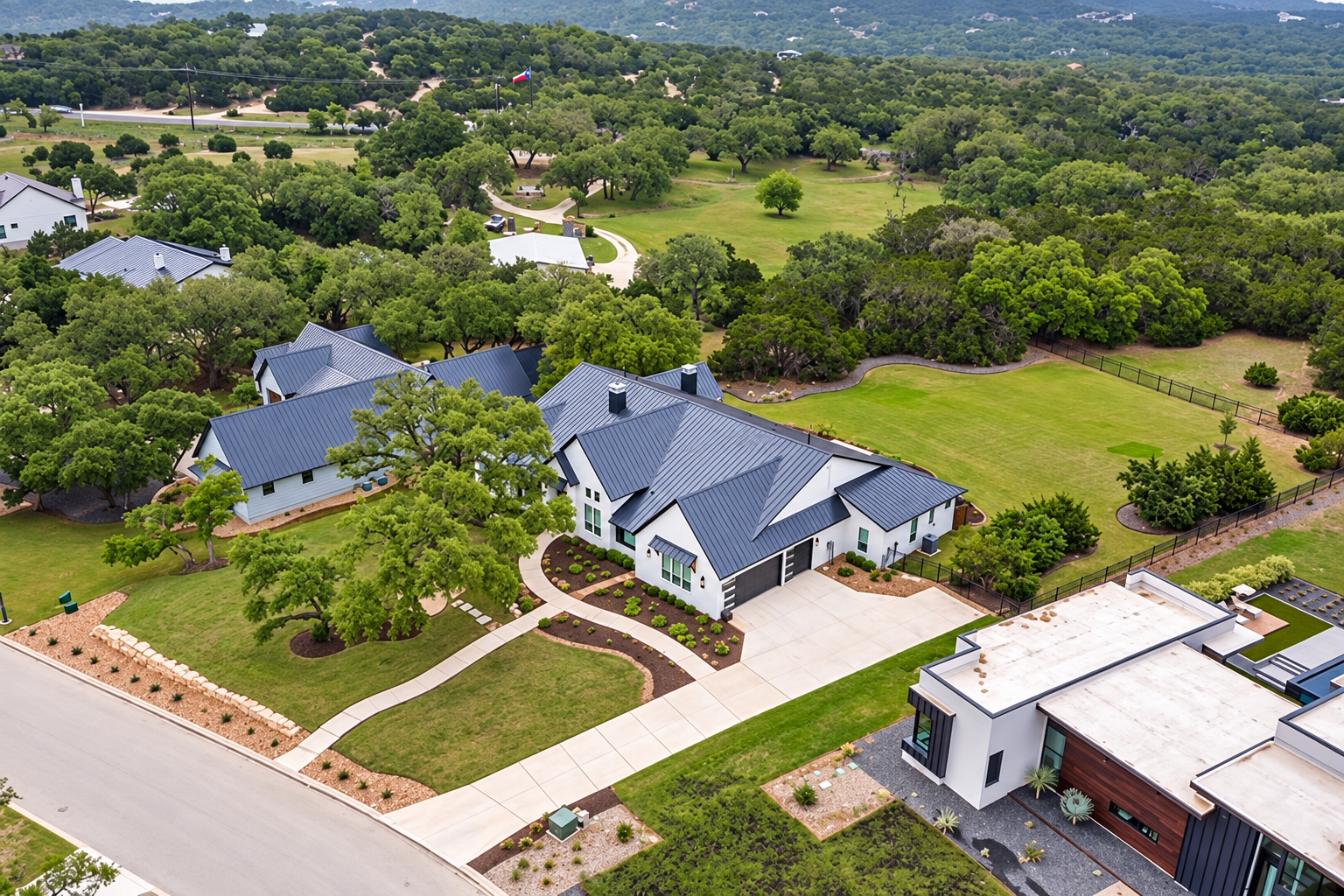 Aerial view of a custom home in the Cantera Hills TX real estate community